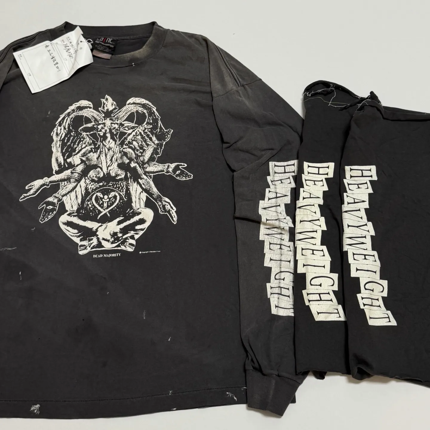 Printed board SAINT Mxxxxxx LS TEE/HEAVY WEIGHT/BLK Sheep head devil distressed long sleeves Washed in black S-XL 25 autumn and winter latest style Cylindrical side seam fabric Rewashed with faded and distressed top printing technology Old crack treatment Correct version Original consistent main mark/washed mark/little angel anti-counterfeiting mark Hand-splashed ink graffiti Wormhole worn Top purchasing level
